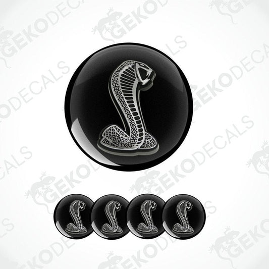A set of black vinyl decals with a white cobra design, typically associated with the FORD SHELBY brand.