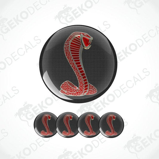 Red Shelby cobra logo on a black with a delicate pattern background