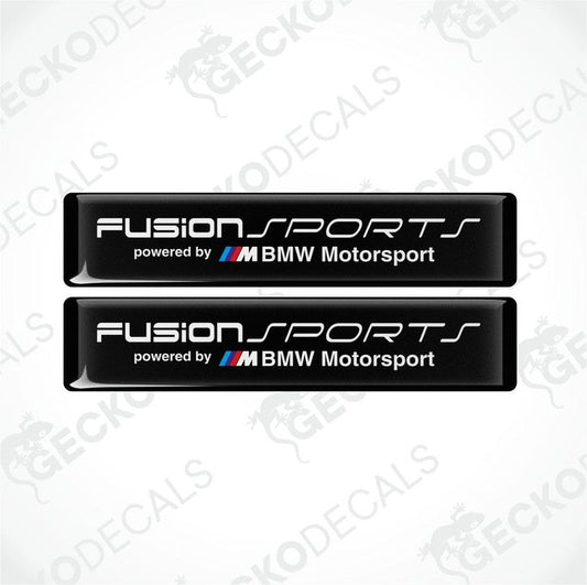 Two black vinyl decals with white text and the BMW Motorsport logo, one above the other, on a white background.
