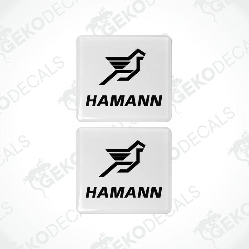 Two white vinyl stickers with the HAMANN logo, one with the logo facing up and the other with the logo facing down.