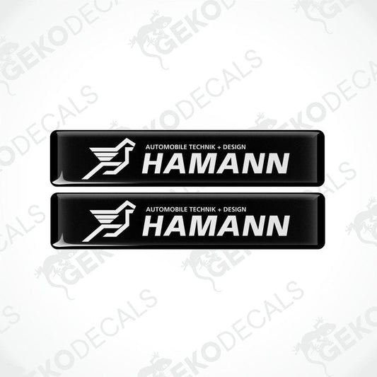 Two rectangular black vinyl decals with the white HAMANN Motorsport GMBH logo.