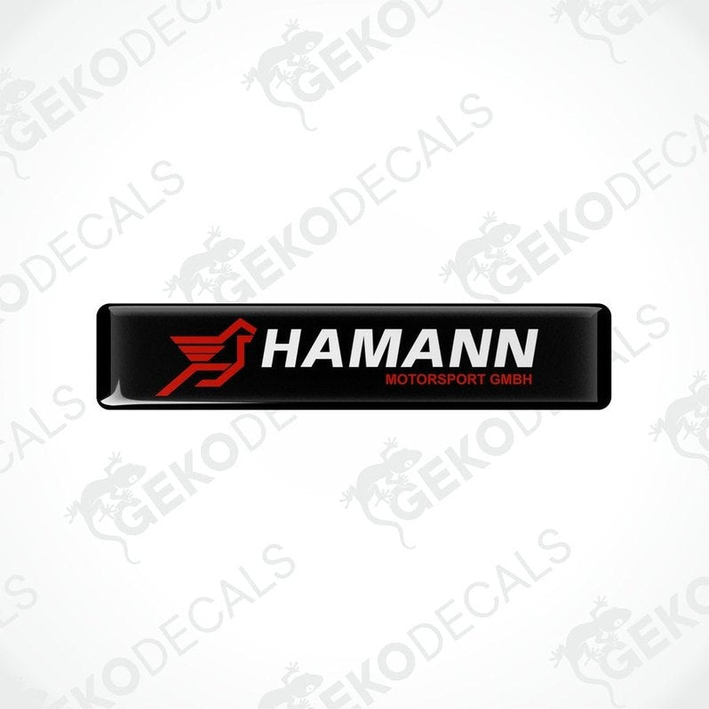 Rectangular black vinyl decals with the red and white HAMANN Motorsport GMBH logo.