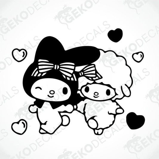 A die cut sticker design featuring Hello Kitty and a sheep with hearts and clouds, primarily in black and white.