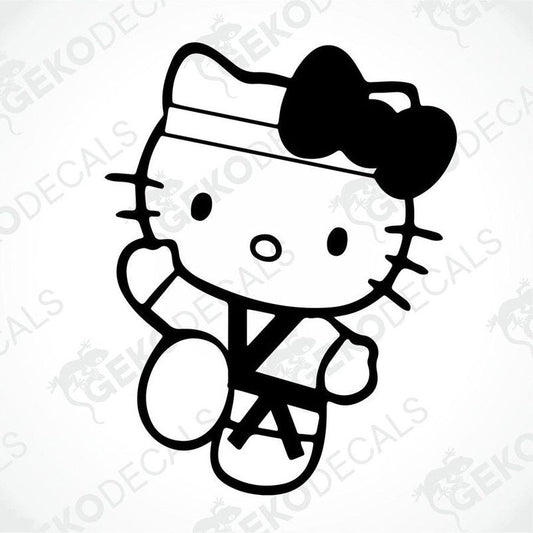 A black and white sticker of Hello Kitty wearing a martial arts outfit.