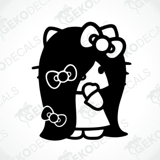 A die cut sticker of Hello Kitty, predominantly in black, with the character's iconic bow design.