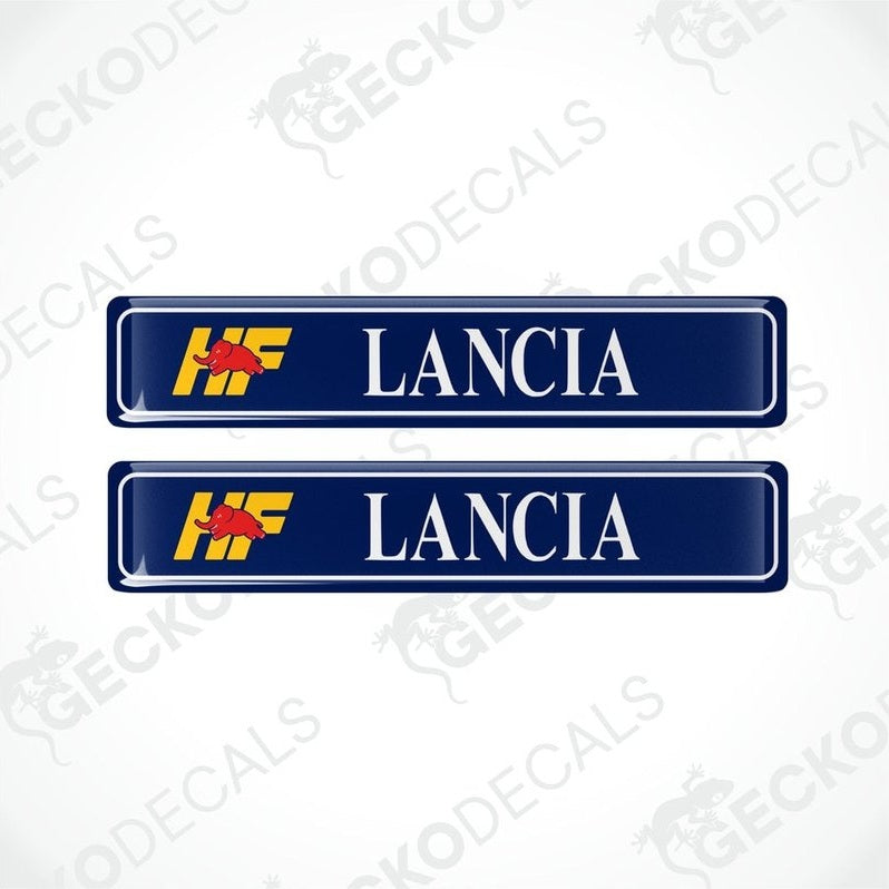 Two blue vinyl stickers with the text 'LANCIA' and the logo 'HF' in yellow and red.