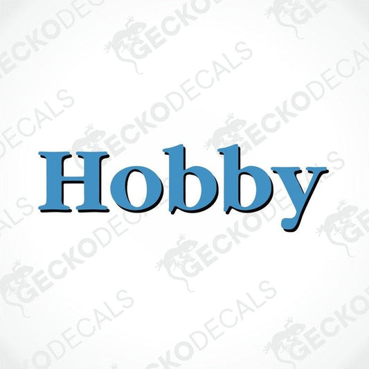 A laminated die cut sticker with the word 'Hobby' printed in blue.