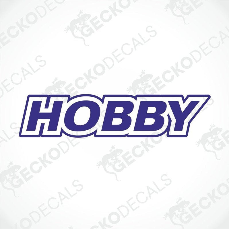A white die cut sticker with the word 'HOBBY' in blue uppercase letters.