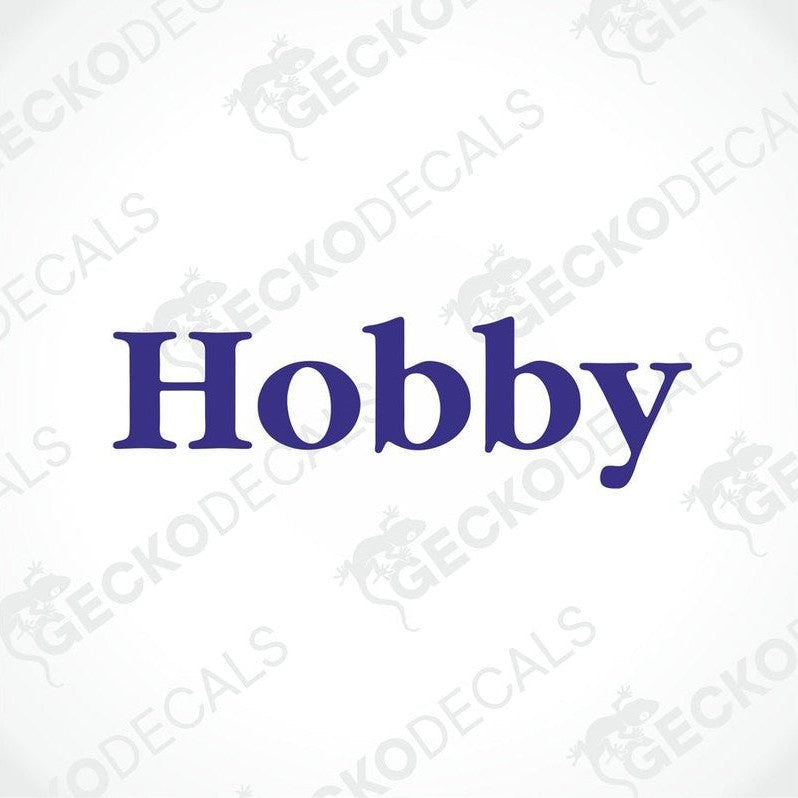 A die cut decal with the word 'Hobby' printed in bold blue letters, designed for use on vehicles such as caravans.