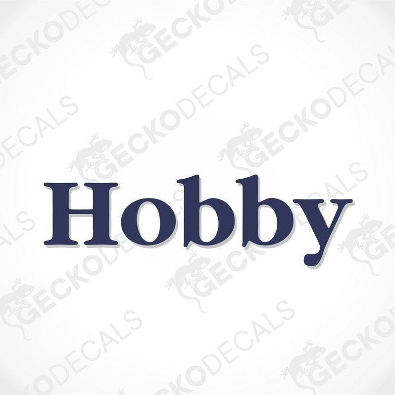 A printed and laminated die cut decal with the word 'Hobby' on a white background, intended for use on vehicles such as caravans.