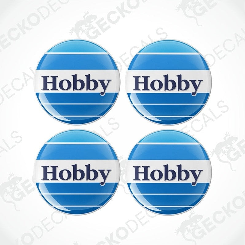 A set of four blue and white circular vinyl decals with the word 'HOBBY' in the center.