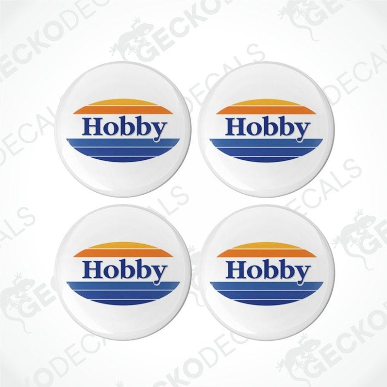 Four circular white vinyl decals with the word 'Hobby' and a colorful geometric design.