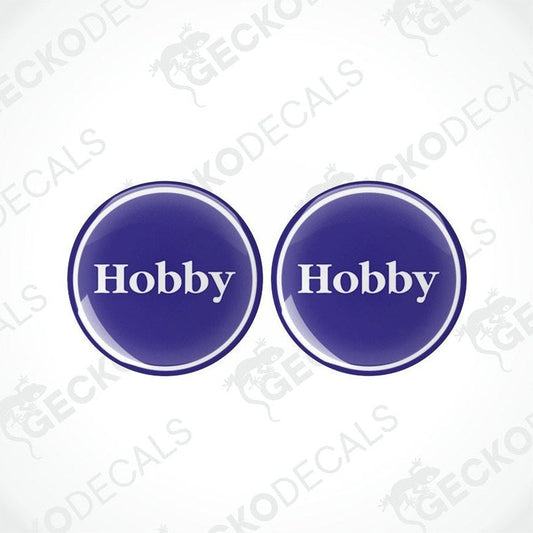 Two blue vinyl stickers with the word 'HOBBY' in the center, placed against a white background with the Gecko Decals logo.