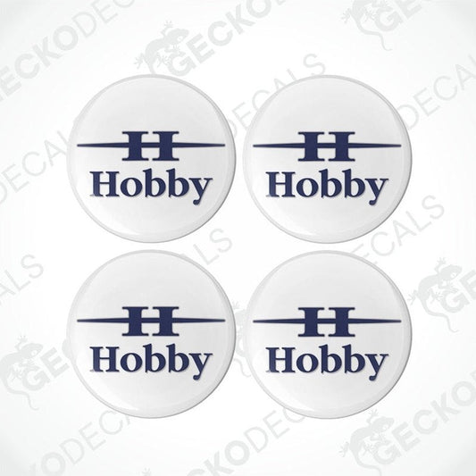 A set of four white vinyl stickers with the word 'HOBBY' printed in blue. Each sticker has a visible Gecko Decals logo at the bottom.
