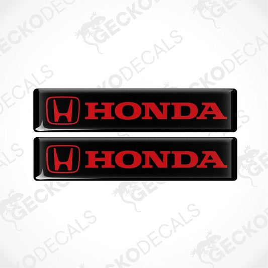 Two black vinyl stickers with the Honda logo in red and white.