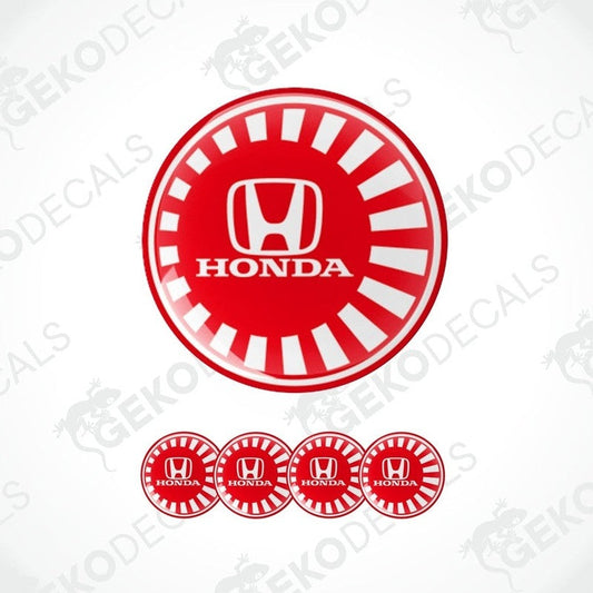 A set of four red and white vinyl decals with the HONDA logo, designed for use as car wheel caps or stickers.