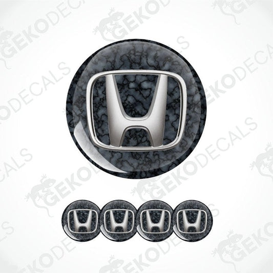 A set of vinyl decals with a polyurethane coating featuring the HONDA logo, displayed on a white background.