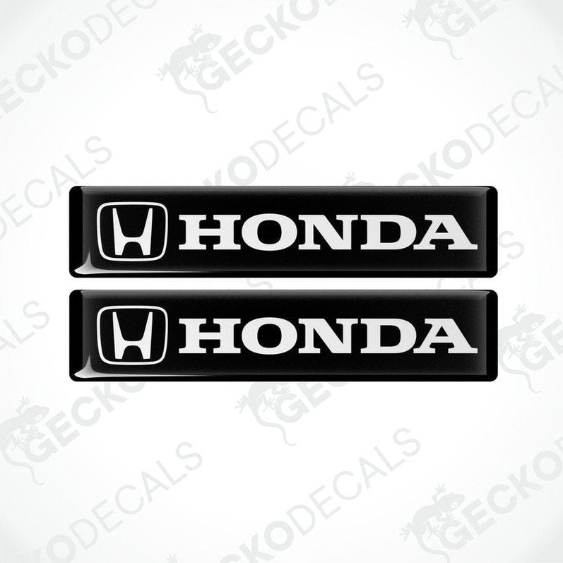 Two black vinyl stickers with the Honda logo in white.