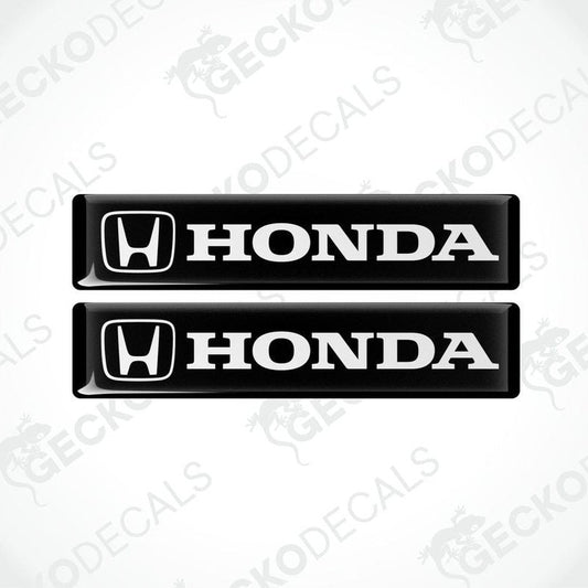 Two black vinyl stickers with the Honda logo in white.