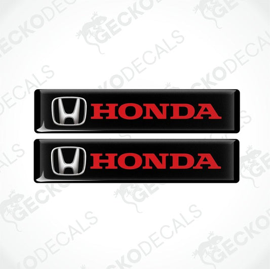 Two black vinyl stickers with the Honda logo in red and silver.