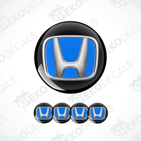 A set of four blue and silver HONDA branded vinyl decals, three in dome shape and one in round shape for vehicle branding.