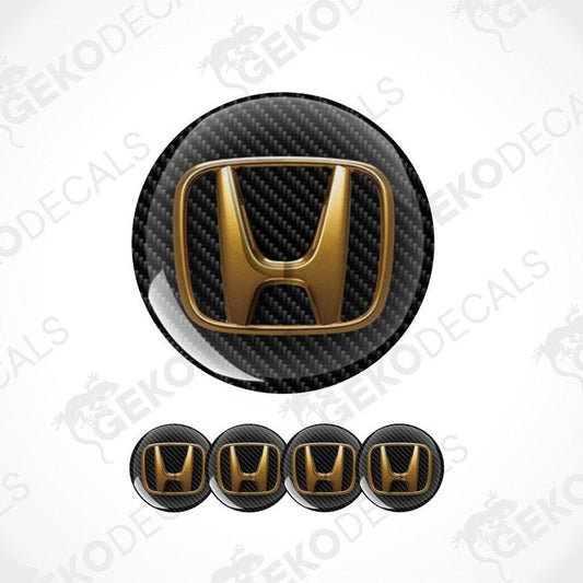 Carbon fiber patterned Honda logo with gold finish on a white background