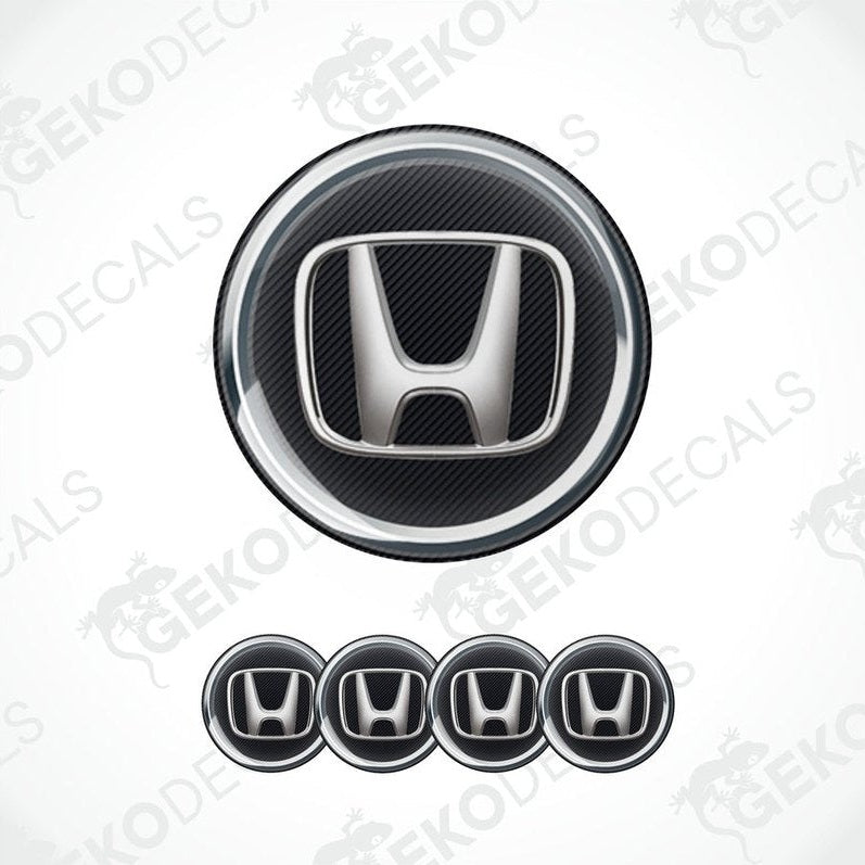 A set of four black vinyl stickers with a Honda logo design, displayed against a white background.