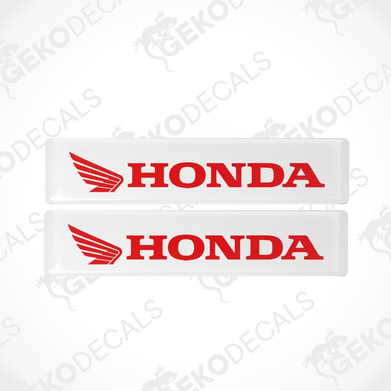 Two Honda decals with red logo and text on a white background.