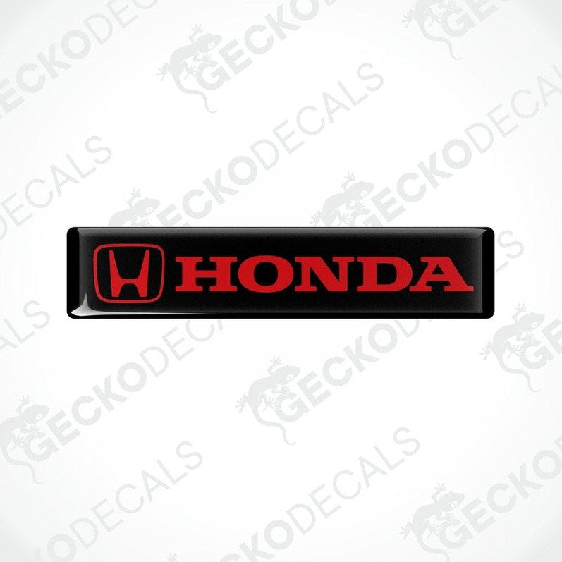 Black vinyl stickers with the Honda logo in red and white.