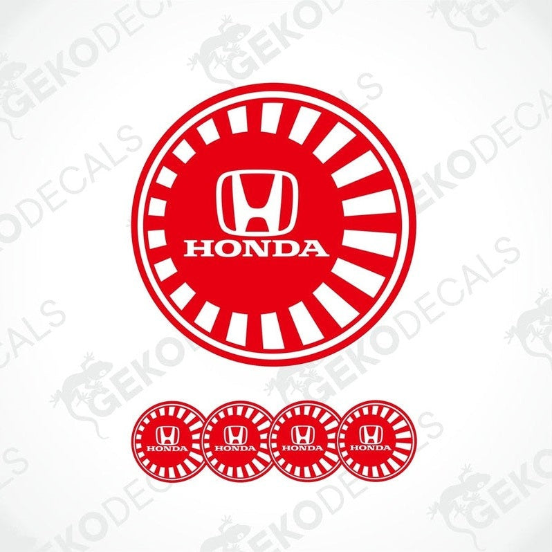 A set of four red and white vinyl decals with the HONDA logo, designed for use as car wheel caps or stickers.