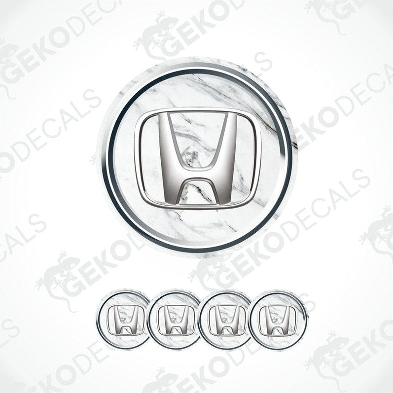 A set of four silver-colored vinyl stickers with a marble pattern design, including a sticker for a car's wheel cap.