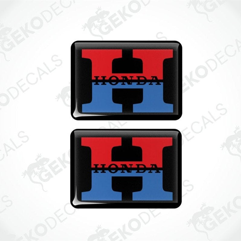 Two Honda logo decals with red and blue design on a white background.