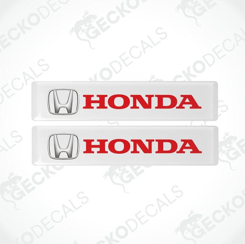 Two white vinyl stickers with the Honda logo in red and silver.