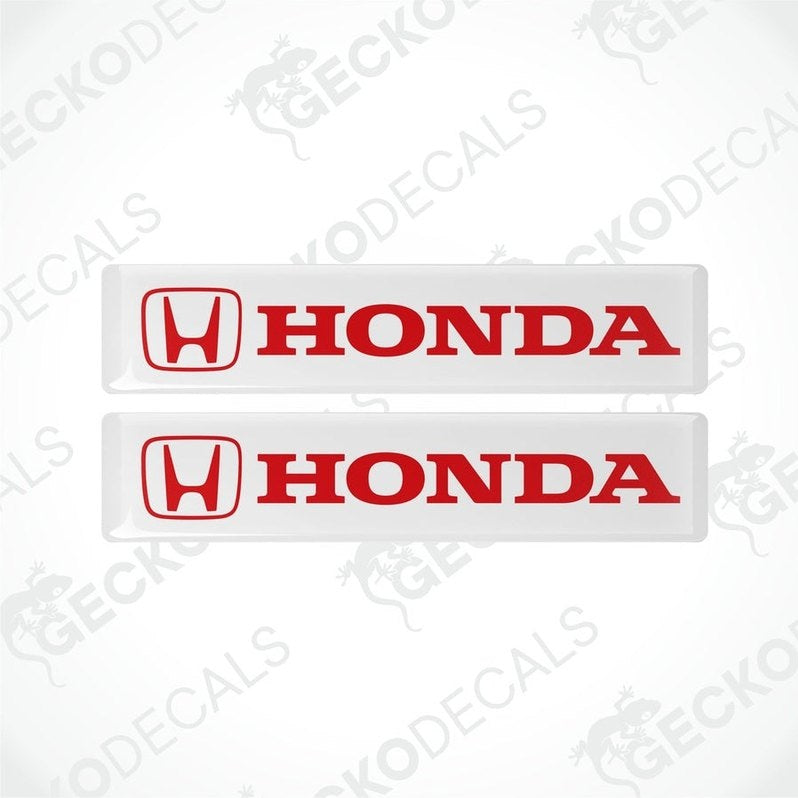 Two white vinyl stickers with the Honda logo in red and white.