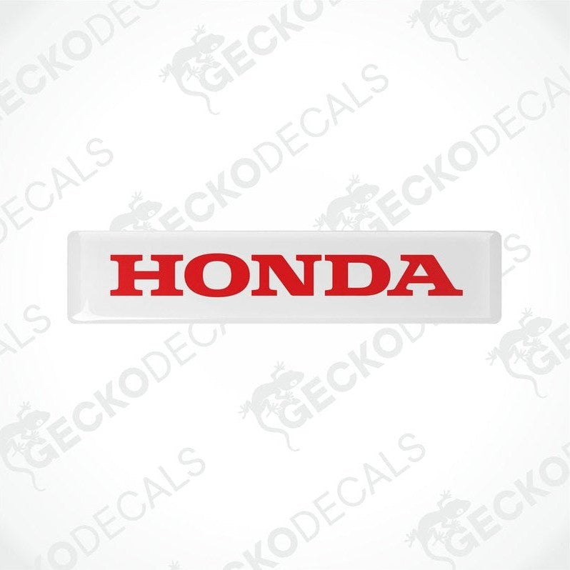Rectangular white vinyl decals with the word 'HONDA' written in bold red letters.