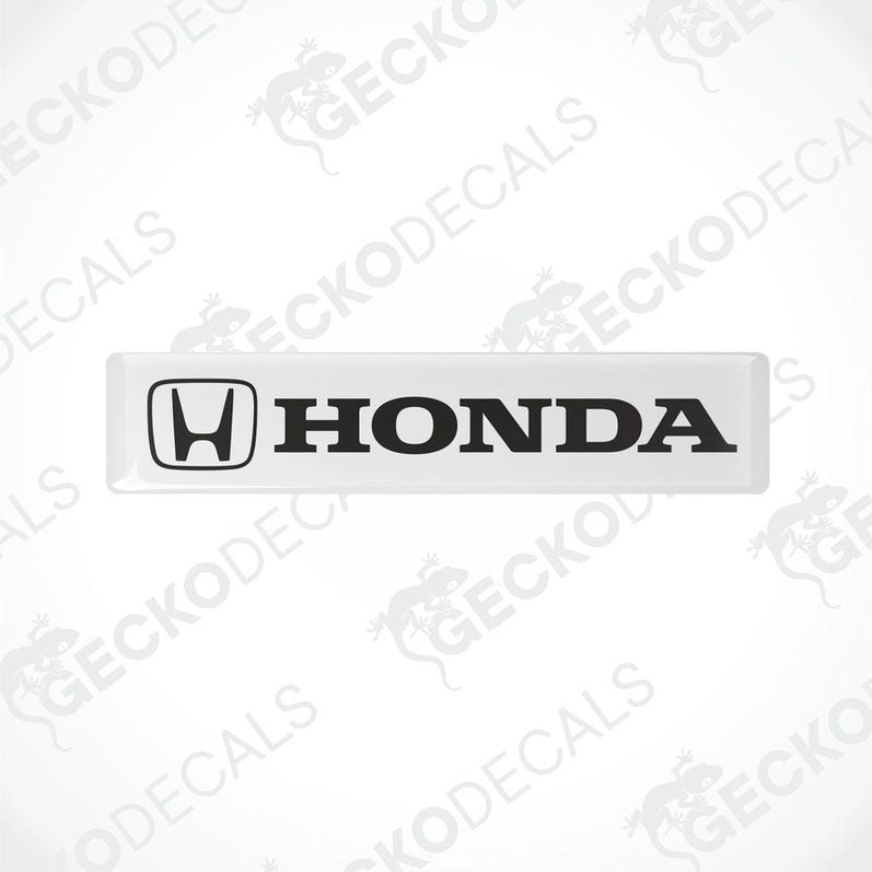 White vinyl stickers with the Honda logo in black.
