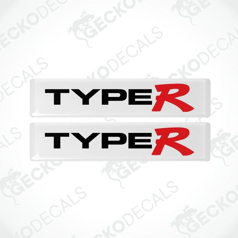 Two white vinyl stickers with the text 'Type R' in red and black, placed against a white background.