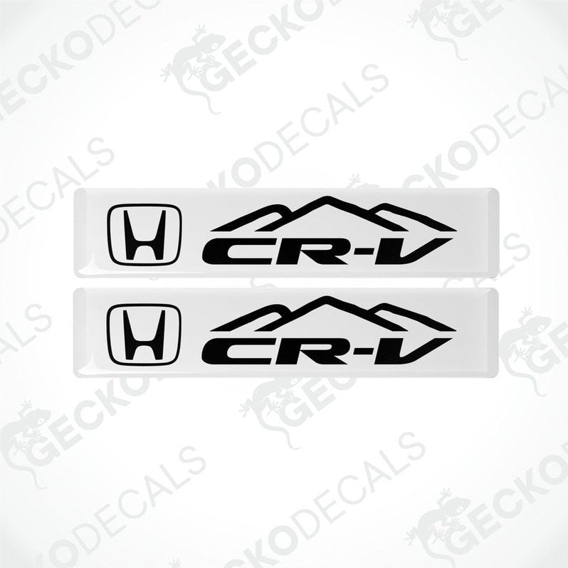 Two white vinyl decals with black text and logo representing a Honda CRV.