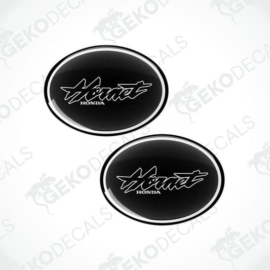 Two black oval stickers with 'Honda' logo on a white background