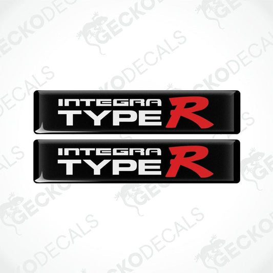 Two black vinyl stickers with the text 'INTEGRA TYPE R' in red and white.