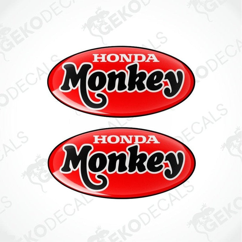 Two red oval Honda Monkey decals on a white background.