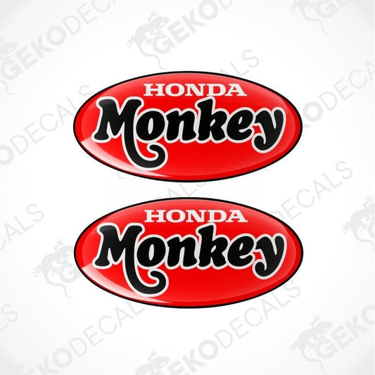 Two red oval Honda Monkey decals on a white background.