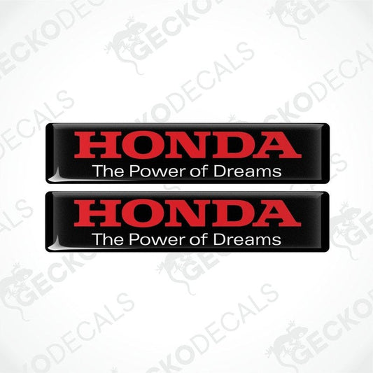 Two rectangular black vinyl decals with red text that reads 'HONDA The Power of Dreams'