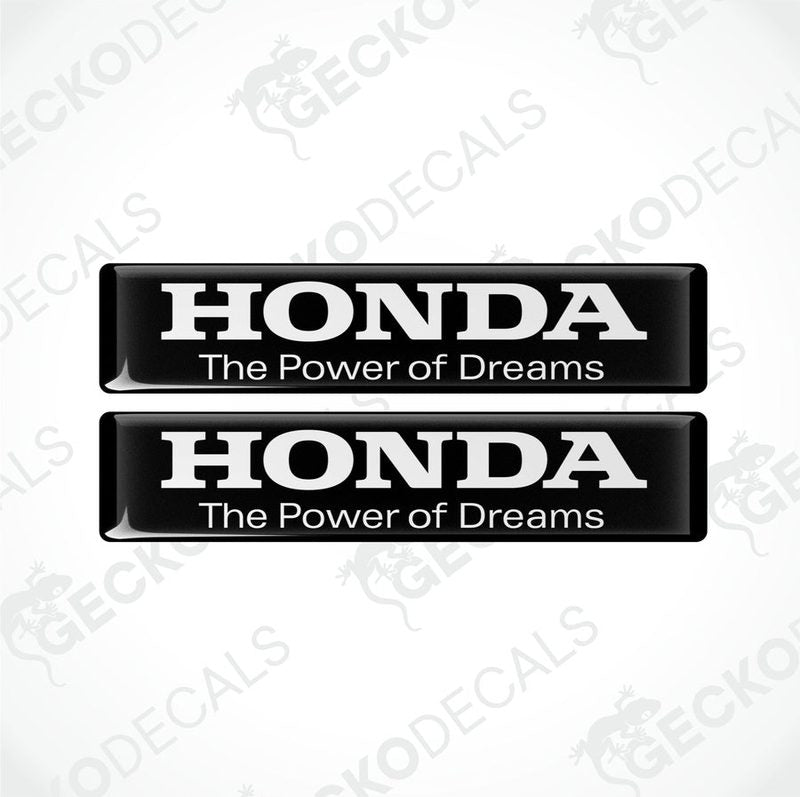 Two rectangular black vinyl decals with white text that reads 'HONDA The Power of Dreams'.