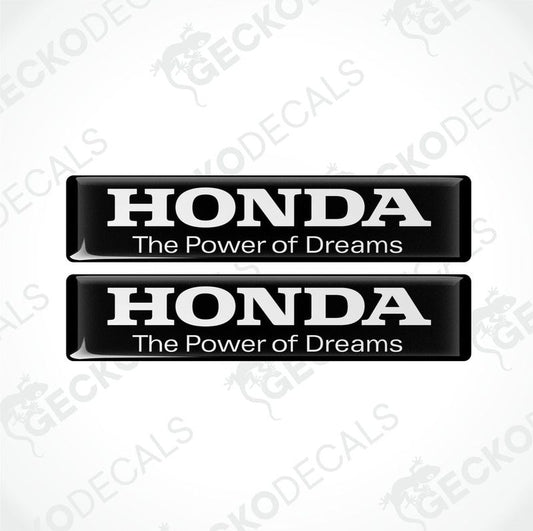 Two rectangular black vinyl decals with white text that reads 'HONDA The Power of Dreams'.