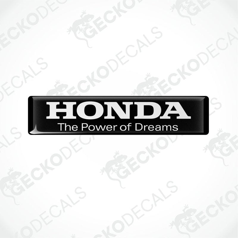Rectangular black vinyl decals with white text that reads 'HONDA The Power of Dreams'.