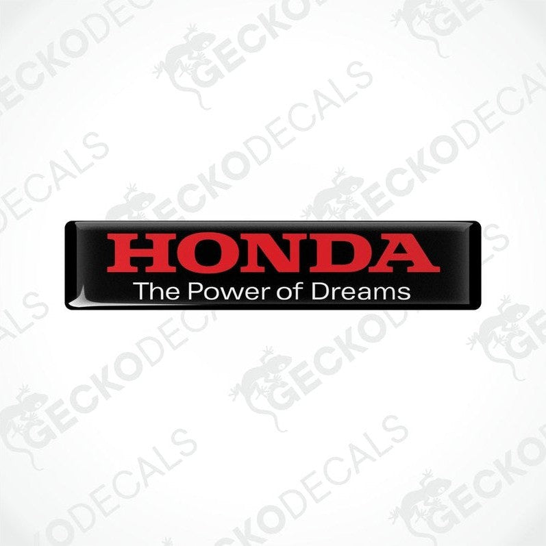 Rectangular black vinyl decals with red text that reads 'HONDA The Power of Dreams'
