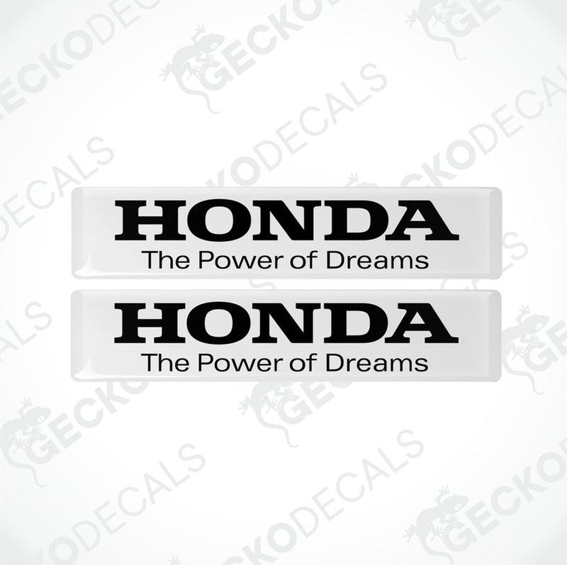 Two rectangular white vinyl decals with black text that reads 'HONDA The Power of Dreams'.