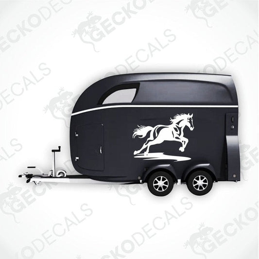 Black galloping horse decal on black trailer side panel