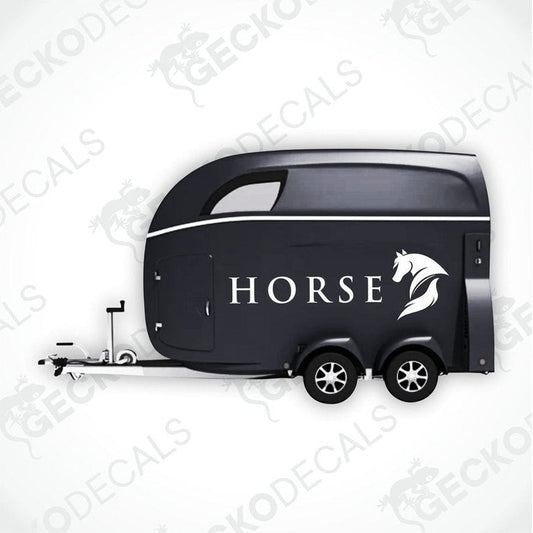A black horse trailer with the word 'HORSE' and a horse logo on the side.